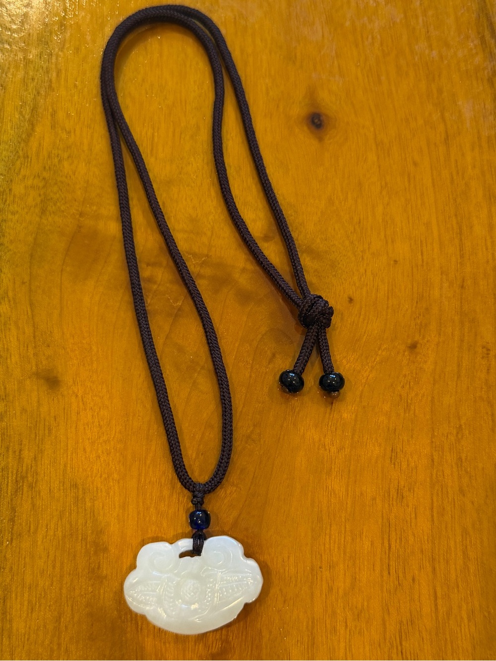 White Jade Cloud Pendant Necklace with Dark Brown Cord
